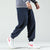 Męskie sztruksowe spodnie joggery z elastycznym pasem